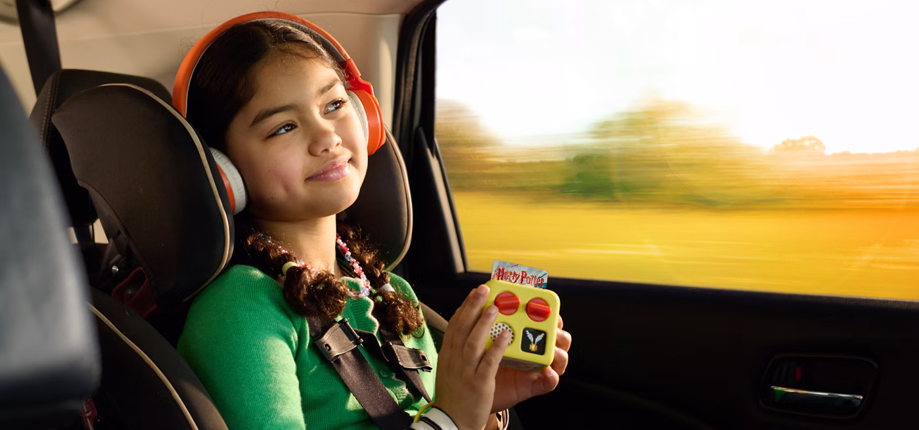 Enfants dans une voiture avec le Yoto Mini